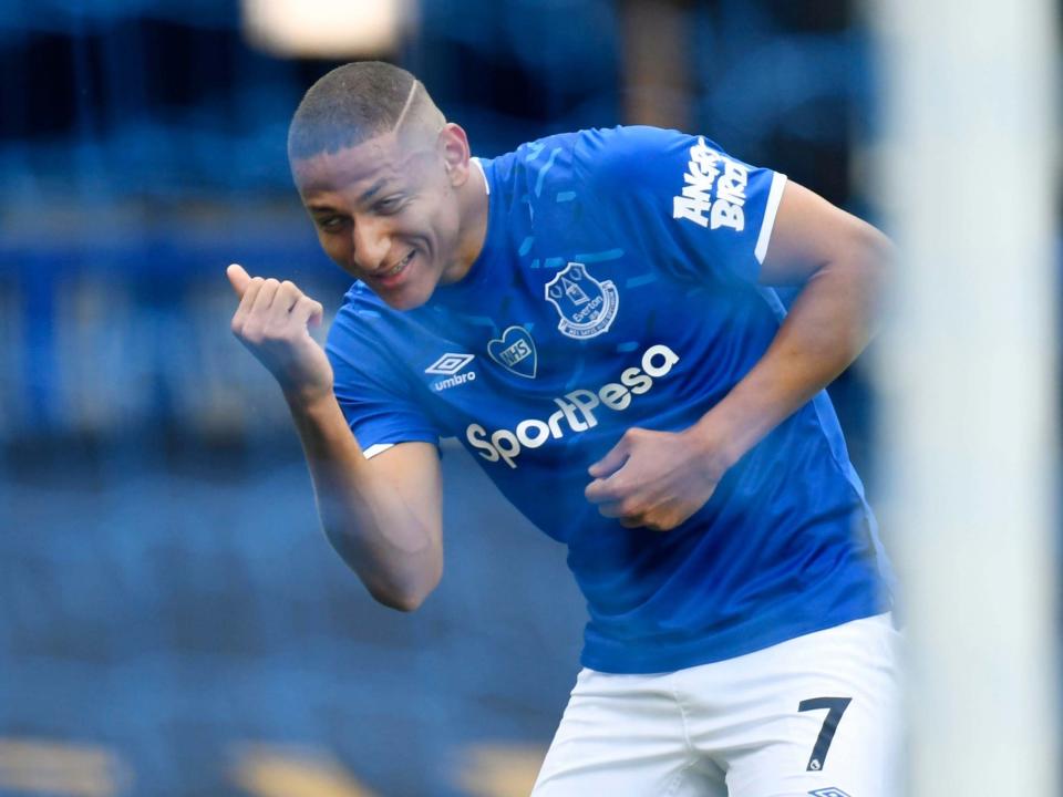 Richarlison celebrates his early goal: Reuters