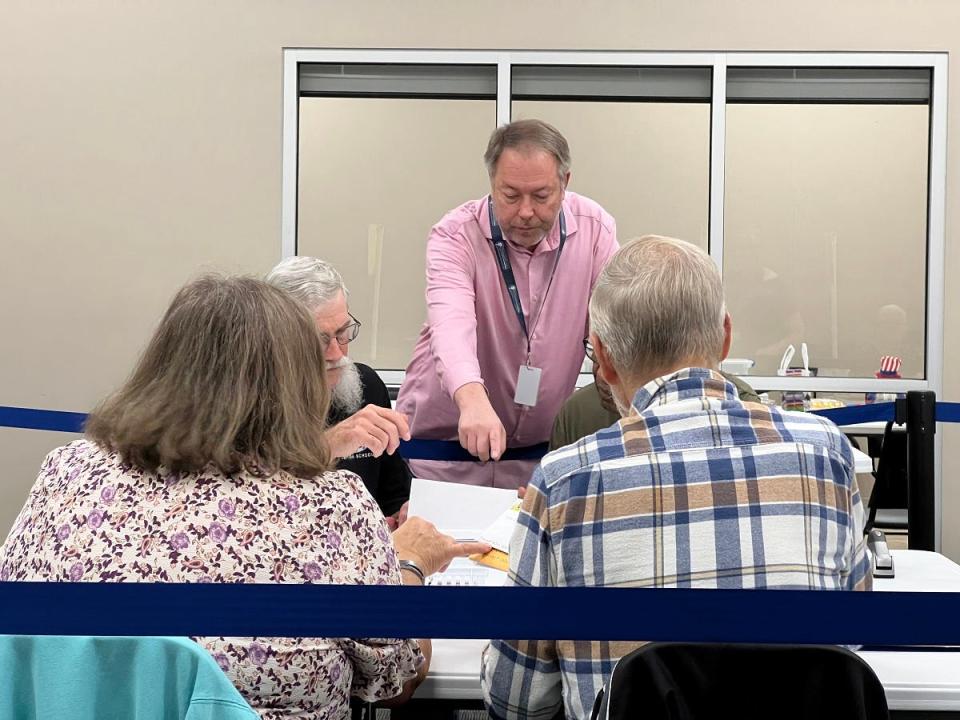 In this file photo, Washington County Deputy Election Director Barry Jackson gives instructions to election workers on the second day of counting mail-in ballots on Nov. 4, 2022. In a July 2023 interview, Jackson said election judges are set to receive a pay raise due to legislation passed by the General Assembly this year, which increases the minimum rate to $250 per day and incentivizes returning judges with a $100 bonus, half of which is paid for by the state.