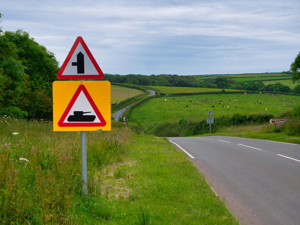 An unusual road sign near the Castlemartin Training Area military firing ranges in Pembrokeshire, Wales