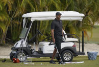 Tiger Woods during a practice session at the Albany Golf Club, on the sidelines of day three of the Hero World Challenge Golf tour, in New Providence, Bahamas, Saturday, Dec. 4, 2021. (AP Photo/Fernando Llano)