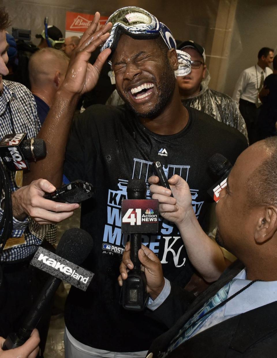 Kansas City Royals’ Lorenzo Cain celebrates with champagne in the clubhouse after their 7-2 win over the Houston Astros during an ALDS baseball game 5 on October 14, 2015 at Kauffman Stadium in Kansas City, Mo.