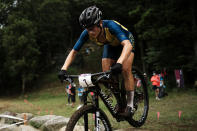 Jenny Rissveds of Sweden competes during the women's cross-country mountain bike competition at the 2020 Summer Olympics, Tuesday, July 27, 2021, in Izu, Japan. (AP Photo/Thibault Camus)