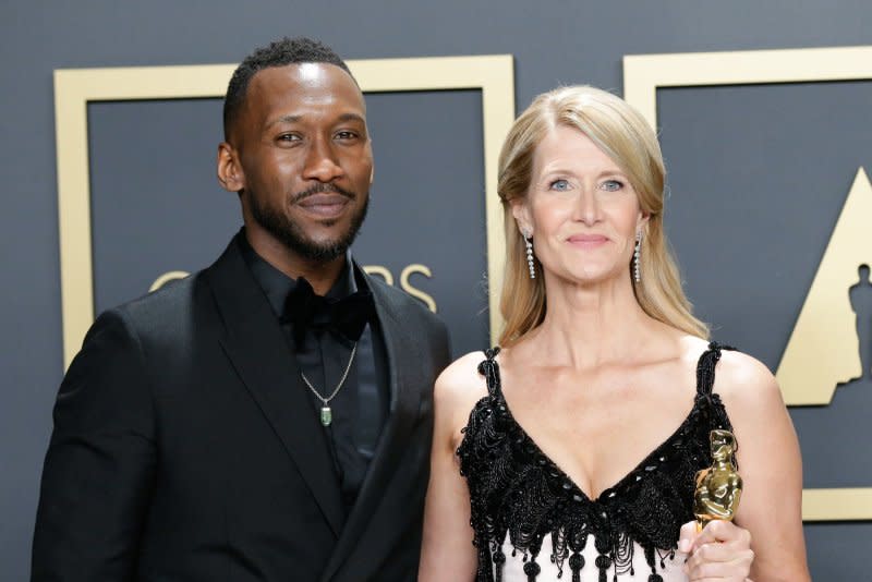 Mahershala Ali (L) and Laura Dern attend the Academy Awards in 2020. File Photo by John Angelillo/UPI