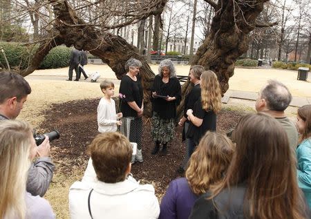 Donna and Tina get married in a park outside the Jefferson County Courthouse in Birmingham, Alabama February 9, 2015. REUTERS/Marvin Gentry