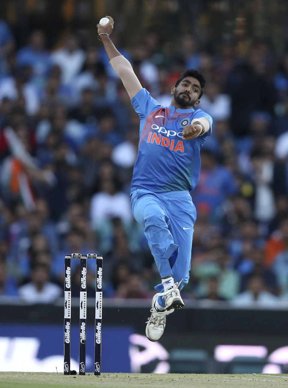 FILE - In this Sunday Nov. 25, 2018 file photo, India's Jasprit Bumrah bowls during their T20 cricket match against Australia in Sydney. The 2019 Cricket World Cup starts in England on May 31. (AP Photo/Rick Rycroft, File)