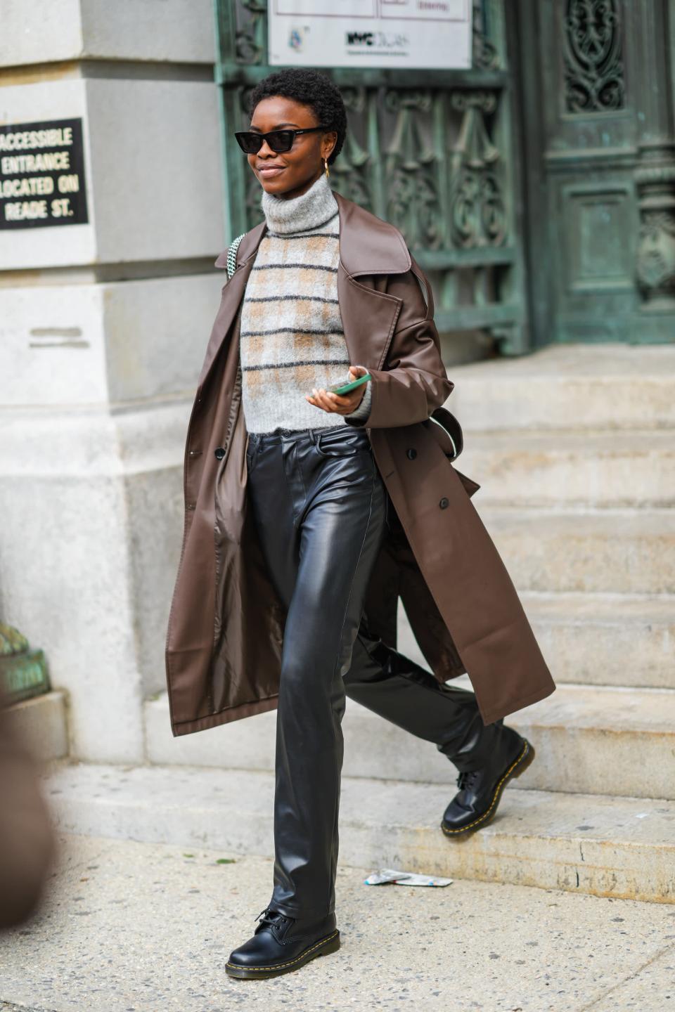 <p>Break up a leather-on-leather look with a fuzzy turtleneck sweater that blends all the shades in your outfit together. </p>