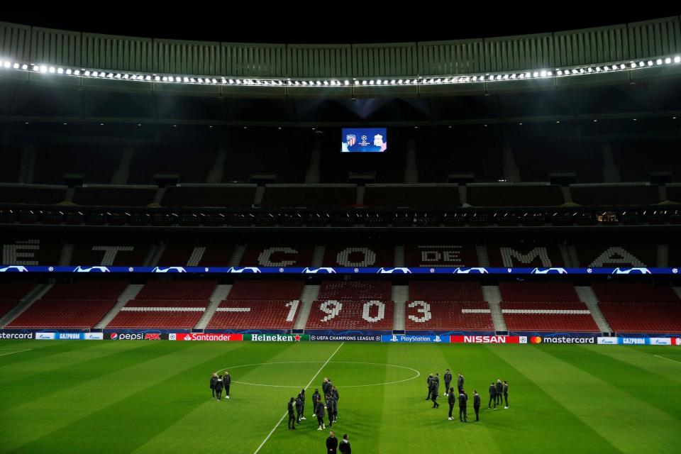 The Liverpool squad walk around the pitch at the Wanda Metropolitano ahead of their Champions League tie against Atletico Madrid Photo: Reuters