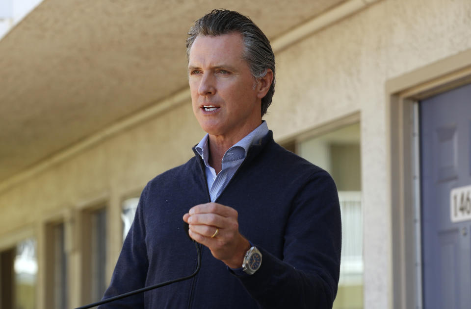 Gov. Gavin Newsom gives an update on the state's initiative to provide housing for homeless Californians to help stem the coronavirus in Pittsburg, Calif. on June 30, 2020. (Rich Pedroncelli/Pool via AP)
