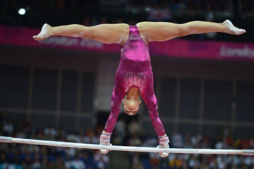 US gymnast Alexandra Raisman performs on the uneven bars during the artistic gymnastics women's individual all-around final during the London 2012 Olympic Games. Raisman said she was disappointed to have missed out on a medal by such a slender margin