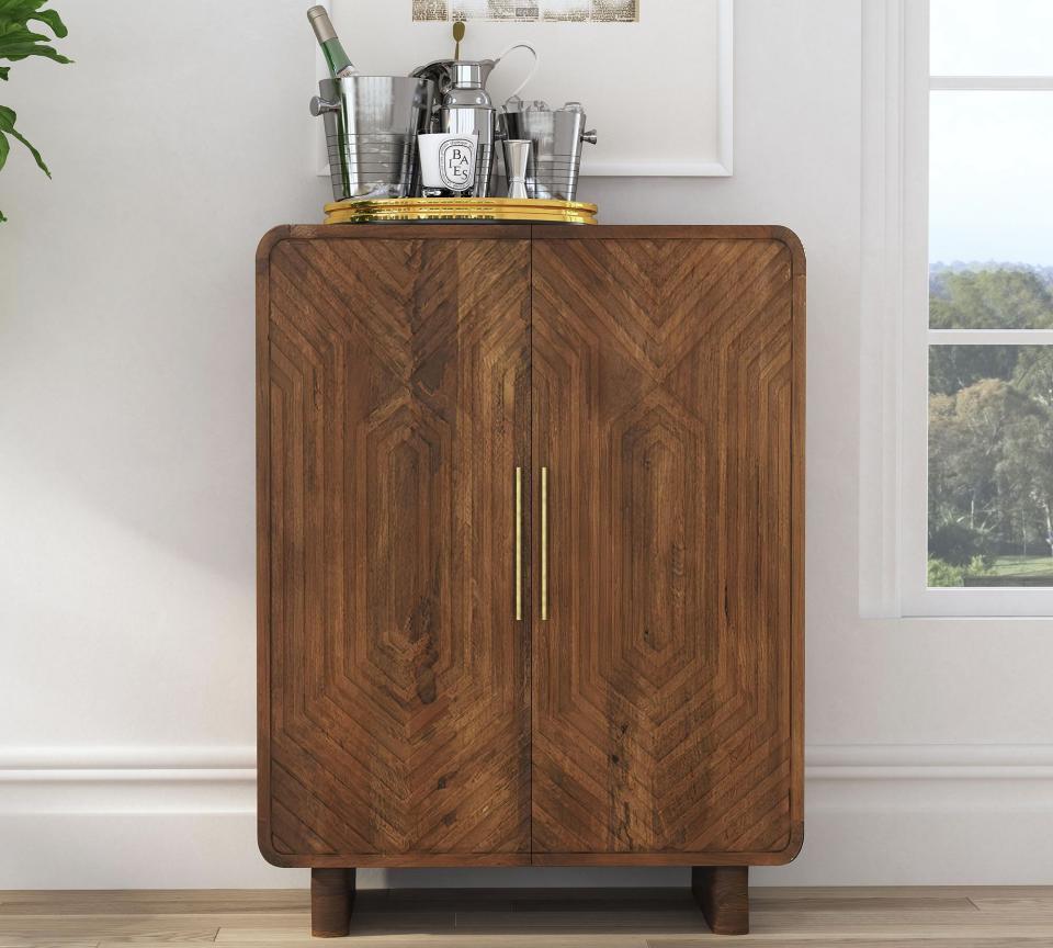 <p><a href="https://go.redirectingat.com?id=74968X1596630&url=https%3A%2F%2Fwww.potterybarn.com%2Fproducts%2Fdelta-bar-cabinet-mp%2F&sref=https%3A%2F%2Fwww.housebeautiful.com%2Fshopping%2Ffurniture%2Fa60430153%2Fbar-cart-debate-2024%2F" rel="nofollow noopener" target="_blank" data-ylk="slk:Shop Now;elm:context_link;itc:0;sec:content-canvas" class="link ">Shop Now</a></p><p>Delta Bar Cabinet</p><p>pottery barn</p><p>$1699.00</p>