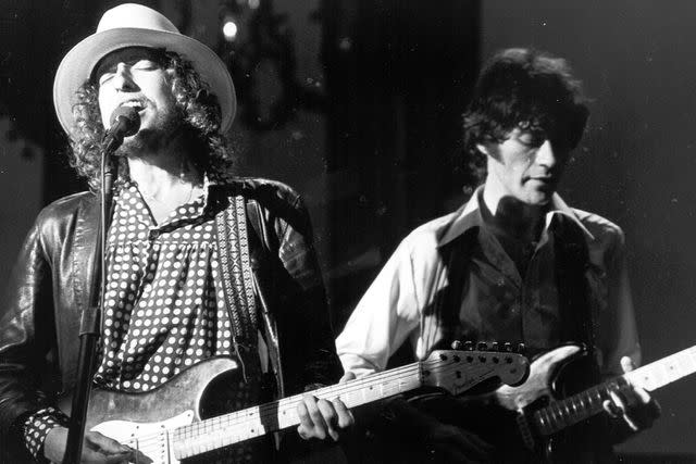 <p> Larry Hulst/Michael Ochs Archives/Getty</p> Bob Dylan and Robbie Robertson in 1976