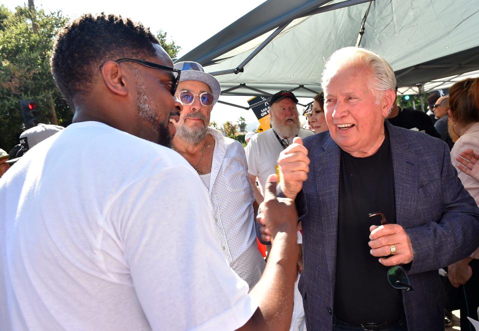 Dulé Hill, from left, Richard Schiff and Martin Sheen attend the Day of Solidarity union rally on Aug. 22, 2023, at Disney Studios in Burbank, California.