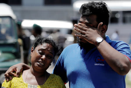 Relatives of victims of the explosion at St. Anthony's Shrine, Kochchikade church react at the police mortuary in Colombo, Sri Lanka April 22, 2019. REUTERS/Dinuka Liyanawatte