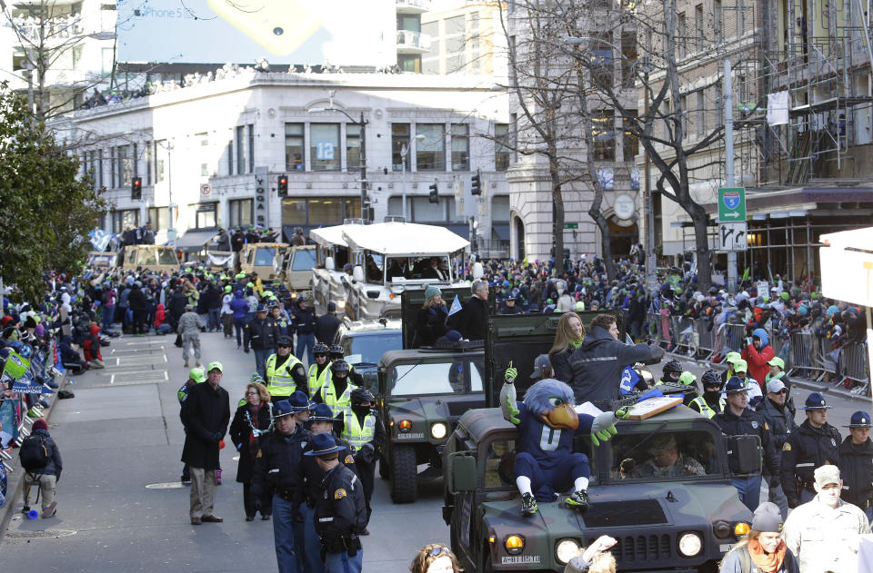 The Seattle Seahawks Super Bowl champions parade moves along the street on Wednesday, Feb. 5, 2014, in Seattle. The Seahawks beat the Denver Broncos 43-8 in NFL football's Super Bowl XLVIII on Sunday. (AP Photo/Ted S. Warren)