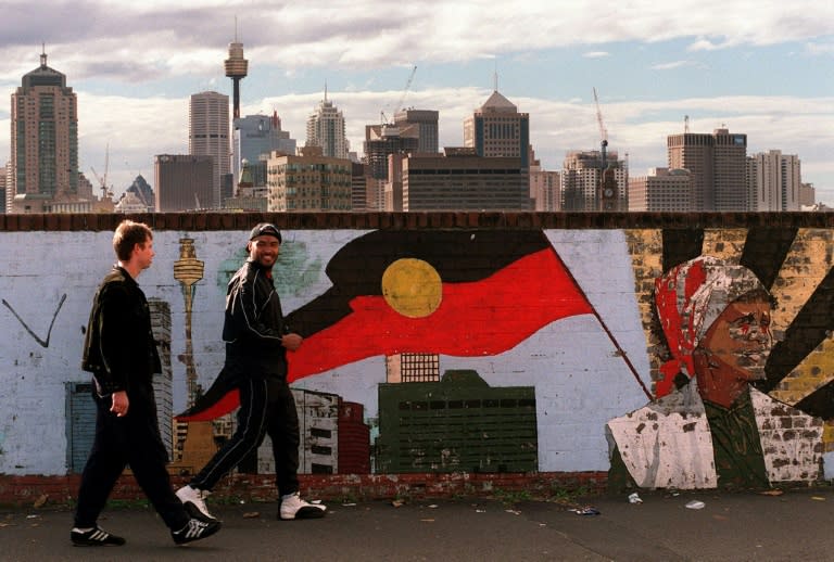 A mural depicting the Aboriginal flag pictured in Sydney