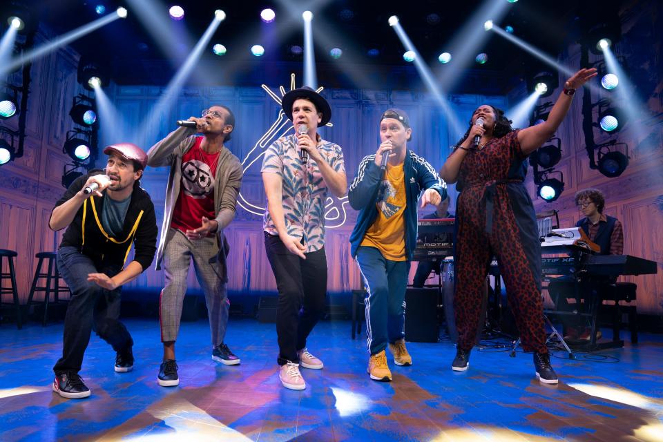 Lin-Manuel Miranda, from left, Utkarsh Ambudkar, Anthony Veneziale, Chris Sullivan, Aneesa Folds, Ian Weinberger (on keyboard back), and Arthur Lewis (on keyboard front) in "Freestyle Love Supreme" at the Booth Theatre.