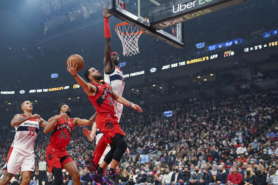 Toronto Raptors guard Fred VanVleet (23) shoots as Washington Wizards centre Montrezl Harrell (6) defends during the first half of an NBA basketball game Wednesday, Oct. 20, 2021, in Toronto. (Evan Buhler/The Canadian Press via AP)