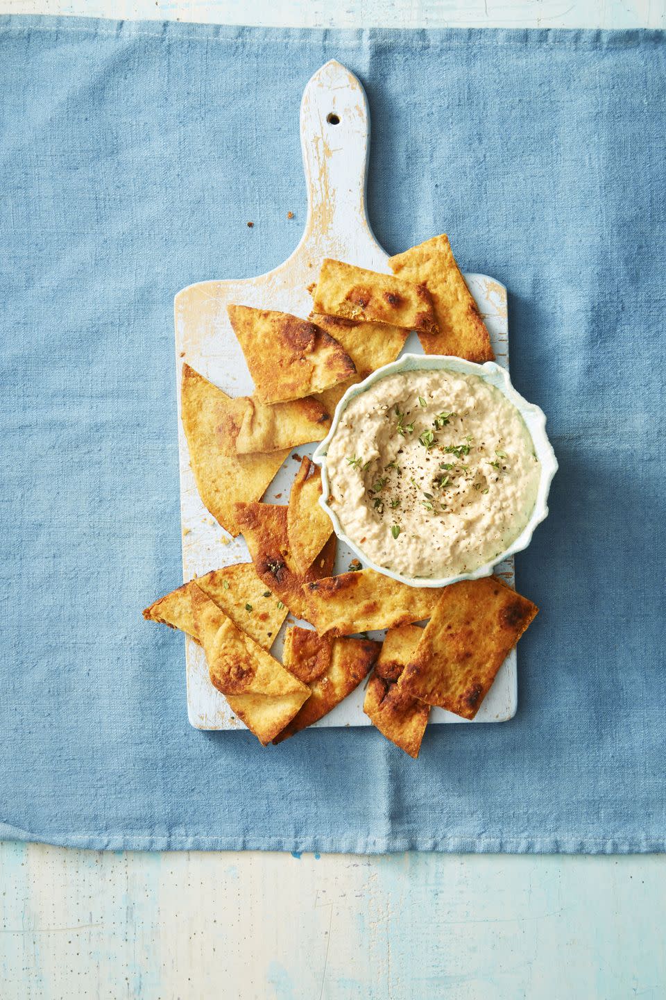 <p>Skip the store-bought options and dip your Naan chips into this creamy goodness instead. </p><p><em><a href="https://www.goodhousekeeping.com/food-recipes/a38842/grilled-onion-dip-recipe/" rel="nofollow noopener" target="_blank" data-ylk="slk:Get the recipe for Grilled Onion Dip »;elm:context_link;itc:0;sec:content-canvas" class="link ">Get the recipe for Grilled Onion Dip » </a></em></p>