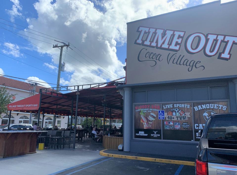 A section of the awning covering the patio at Time Out Sports Bar in Cocoa Village was torn off by Hurricane Nicole.