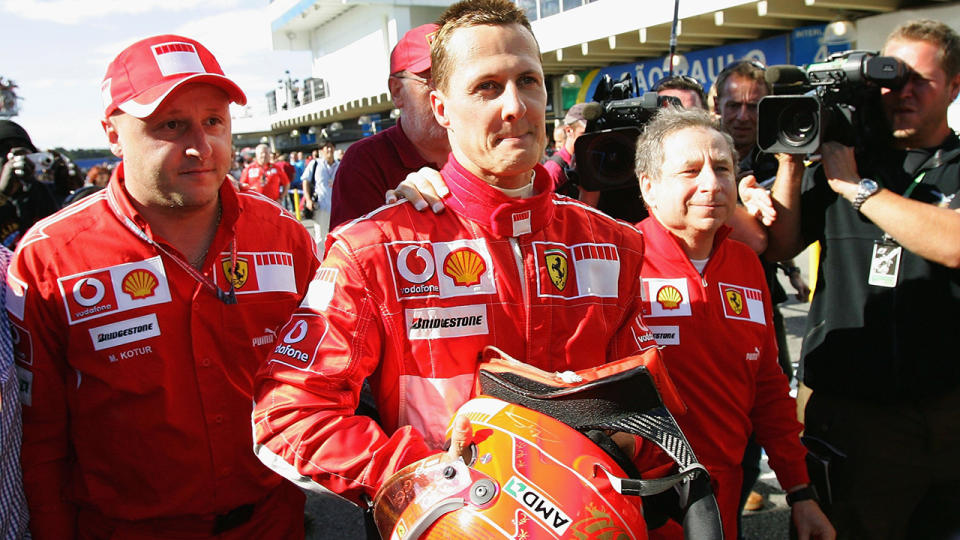 Michael Schumacher, pictured here with Jean Todt (R) in 2006.