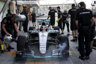 Mercedes Formula One Driver Lewis Hamilton of Britain stops at the pit lane during the first free practice session of Abu Dhabi F1 Grand Prix at the Yas Marina circuit in Abu Dhabi November 27, 2015. REUTERS/Ahmed Jadallah