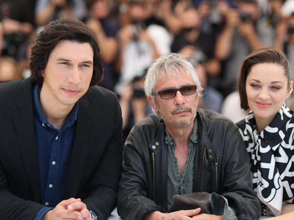 Adam Driver, Leos Carax and Marion Cotillard at Cannes Film Festival (AFP via Getty Images)