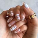 <p>Negative space nail art still looks awesome - why not try monochrome deckchair stripes?</p>