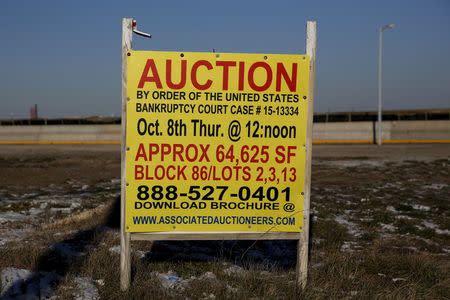 An auction sign is seen on a piece of property in Atlantic City, New Jersey, January 19, 2016. REUTERS/Shannon Stapleton