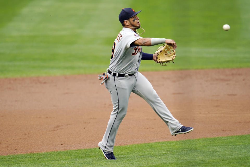 Detroit Tigers third baseman Isaac Paredes throws out Minnesota Twins' Brent Rooker after fielding a short grounder in the first inning of a baseball game Monday, Sept. 7, 2020, in Minneapolis. (AP Photo/Jim Mone)