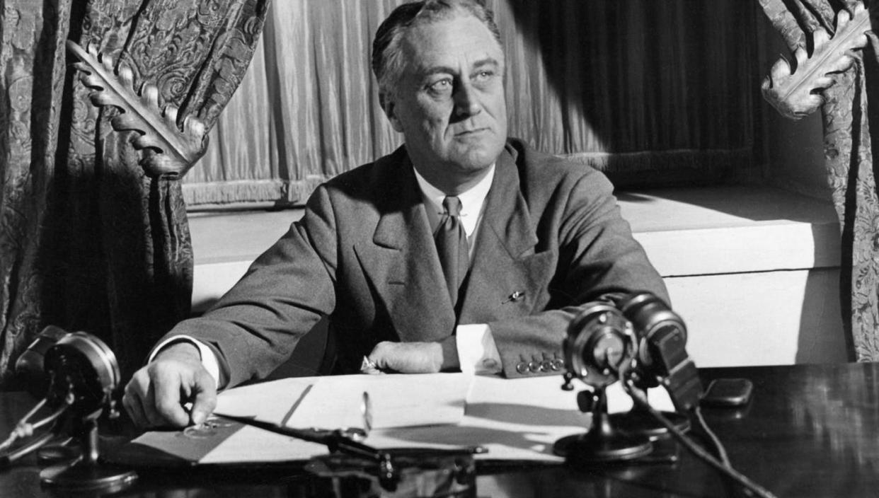 <span class="caption">President Franklin D. Roosevelt broadcasting his first fireside chat, March 12, 1933. </span> <span class="attribution"><a class="link " href="https://catalog.archives.gov/id/6728517" rel="nofollow noopener" target="_blank" data-ylk="slk:National Archives;elm:context_link;itc:0;sec:content-canvas">National Archives</a></span>
