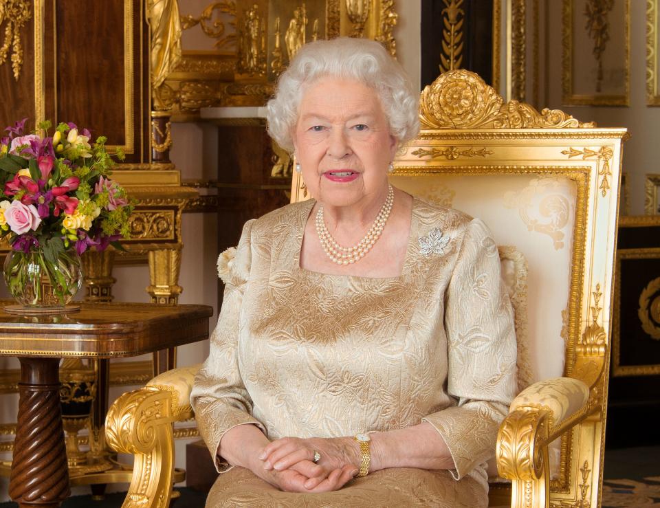 Queen Elizabeth II dressed in a gold color dress was captured on camera and she shows that old age has nothing on her