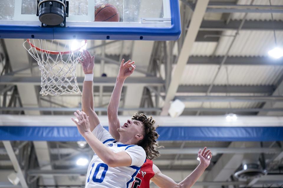 Leominster's Osiris Lopez shoots versus South High.