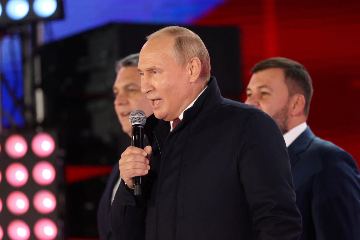 Russian President Vladimir Putin and Denis Pushilin and Leonid Pasechnik, who are the Russian-installed leaders in Ukraine's Donetsk and Luhansk regions, attend a concert marking the declared annexation of the Russian-controlled territories of four Ukraine's Donetsk, Luhansk, Kherson and Zaporizhzhia regions, after holding what Russian authorities called referendums