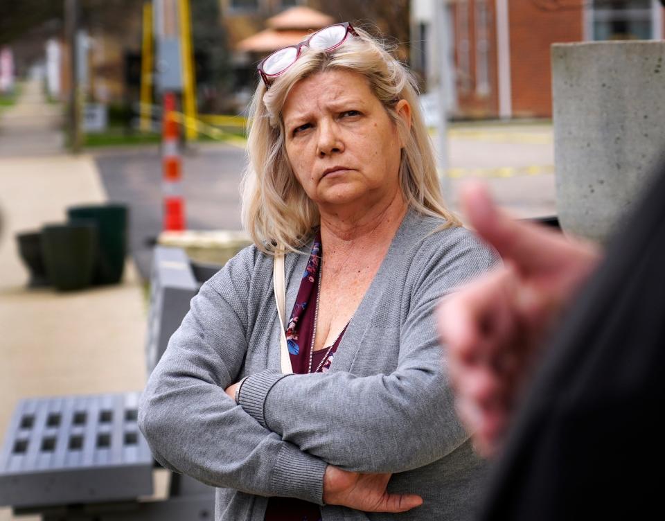 Wilma McCoy, sister and aunt to victims in the 2016 Pike County massacre, listens to lawyers for George “Billy” Wagner III outside the Pike County Courthouse in March.