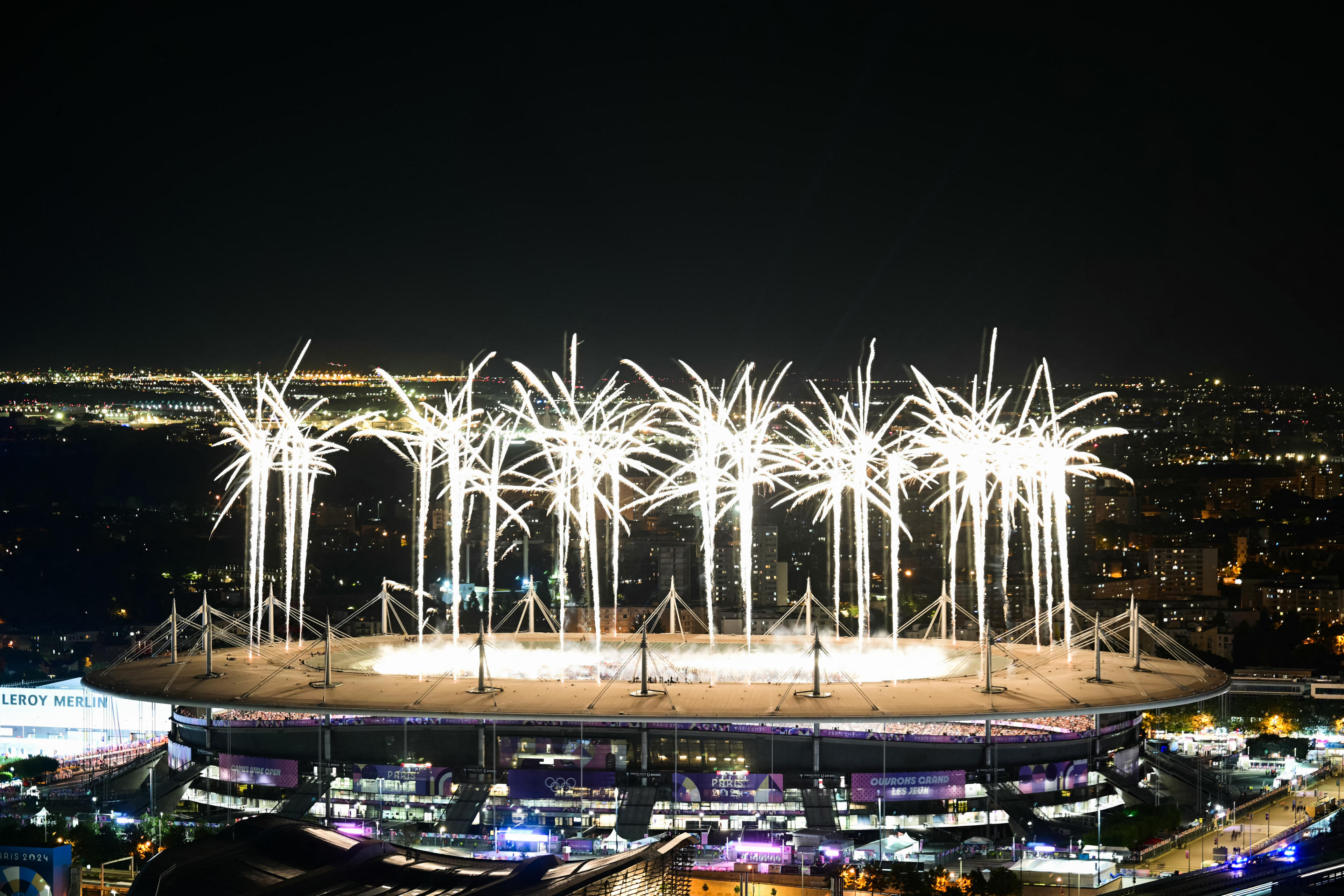 TOPSHOT - Fireworks illuminate the sky during the closing ceremony of the Paris 2024 Olympic Games at the Stade de France, in Saint-Denis, in the outskirts of Paris, on August 11, 2024. (Photo by Mauro PIMENTEL / AFP) (Photo by MAURO PIMENTEL/AFP via Getty Images)