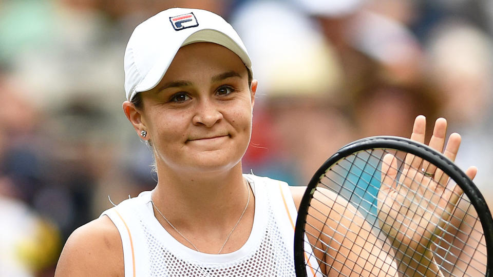 Seen here, Ash Barty applauds fans at the 2019 Wimbledon tournament.