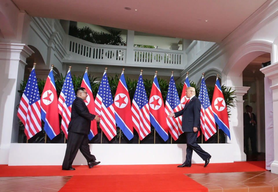 The two men stride to greet each other (Picture: Getty)