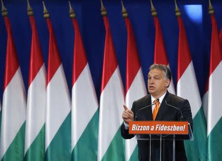 Hungary's Prime Minister Viktor Orban delivers a speech at an event of his ruling Fidesz party to celebrate the results of recent local government elections in Budapest October 19, 2014. REUTERS/Laszlo Balogh