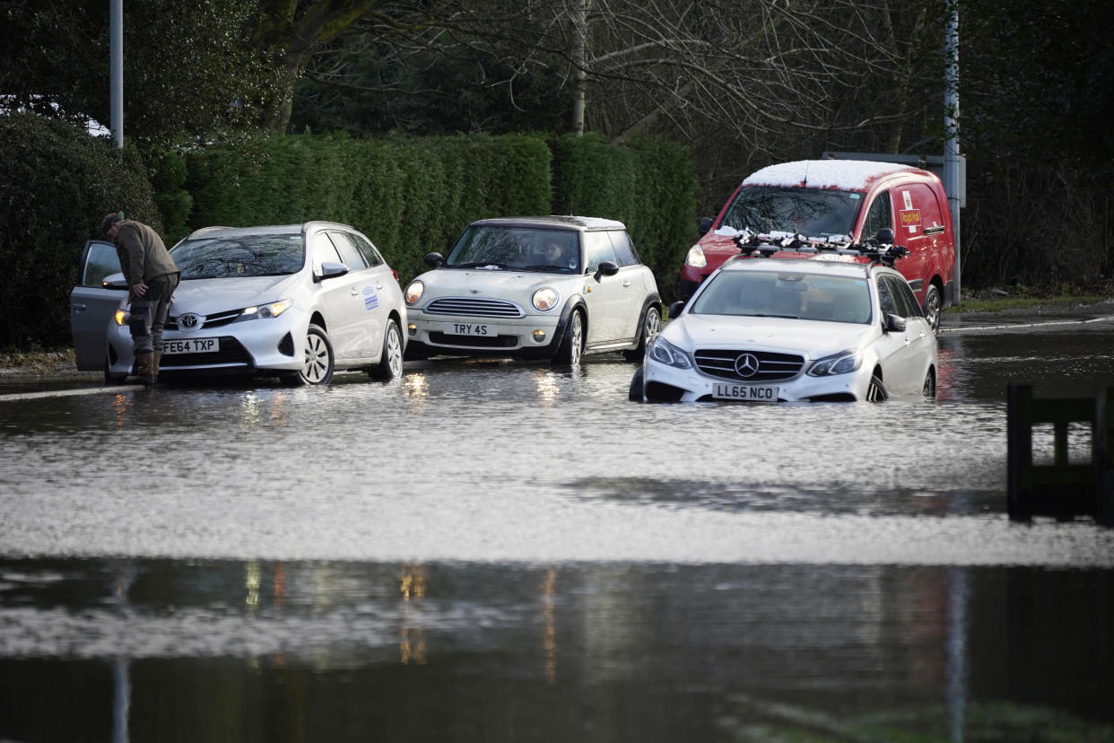 LYMM, UNITED KINGDOM - JANUARY 20: Cars are abandoned in floodwater on January 20, 2021 in Lymm, Cheshire. Danger to life flood warnings are given along the River Mersey in East Didsbury, West Didsbury and Northenden as Storm Christoph moves in on the UK.  (Photo by Christopher Furlong/Getty Images)