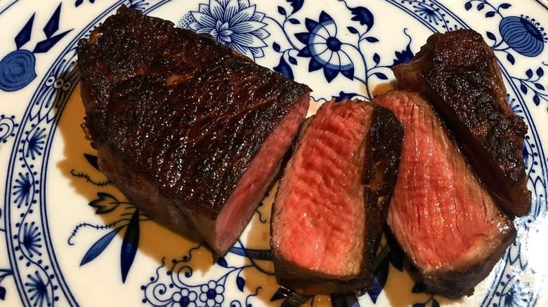 Medium rare steak on a plate