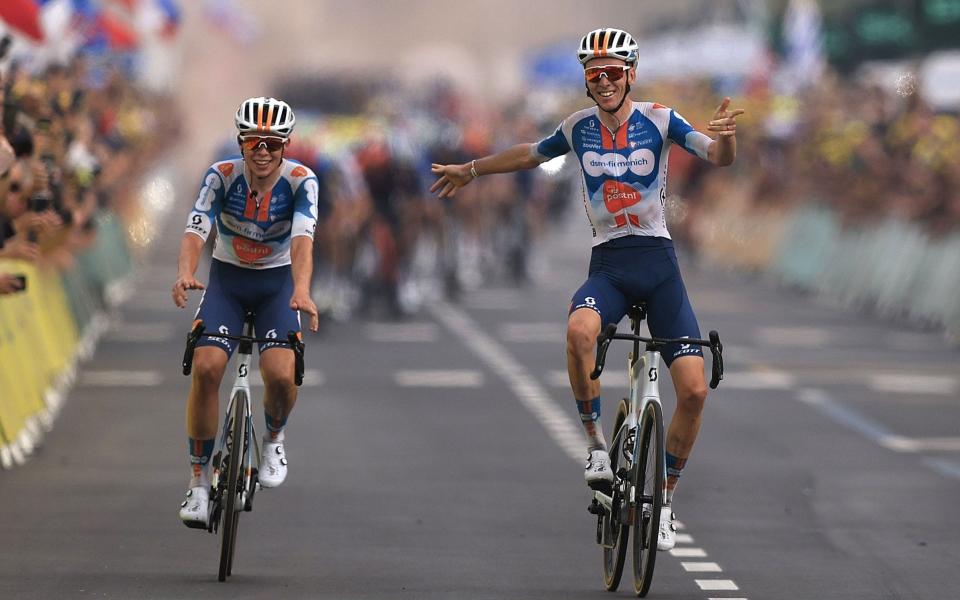 Van Den Broek (left) crossing the line with Bardet yesterday