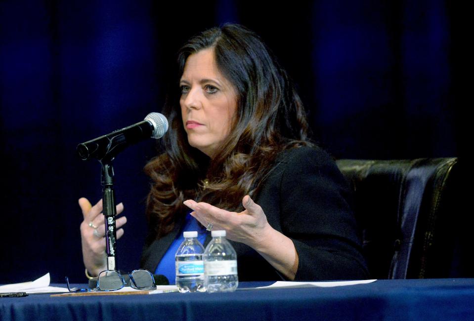 Treasurer and candidate for mayor Misty Buscher answers questions during a forum with incumbent mayor Jim Langfelder at the Hoogland Center for the Arts Wednesday Jan. 25, 2023.