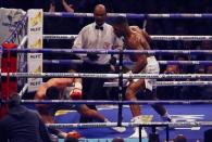 Britain Boxing - Anthony Joshua v Wladimir Klitschko IBF, IBO & WBA Super World Heavyweight Title's - Wembley Stadium, London, England - 29/4/17 Wladimir Klitschko is knocked down by Anthony Joshua Action Images via Reuters / Peter Cziborra