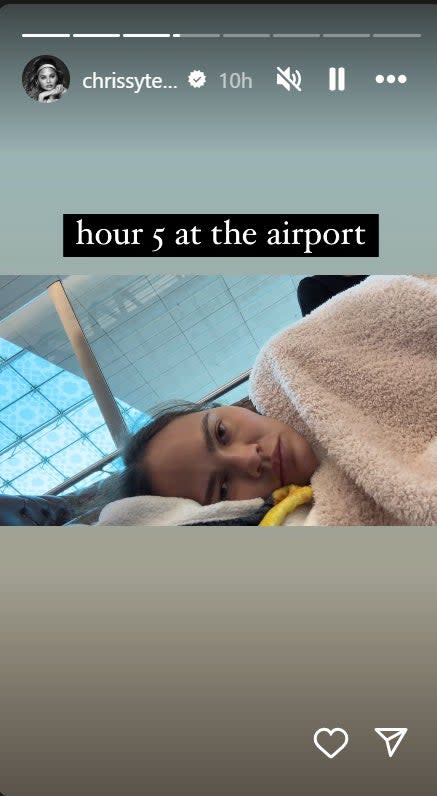 The 'Cravings' author shared a photo of her catching rest while they waited to depart