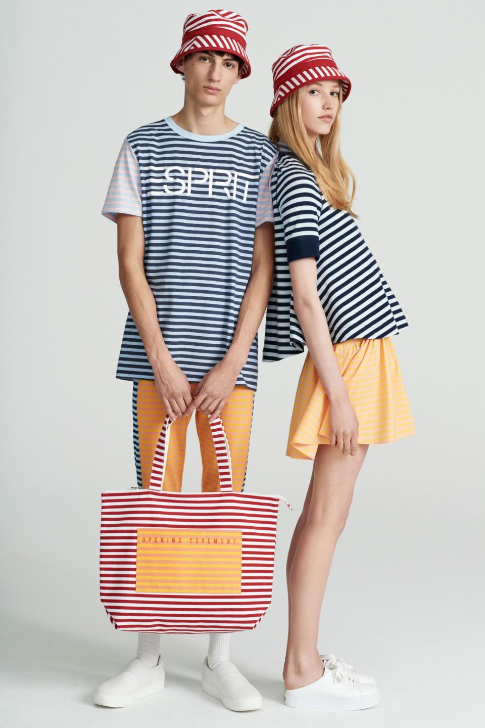 Models wear navy striped tees and yellow bottoms from the Esprit by Opening Ceremony collection