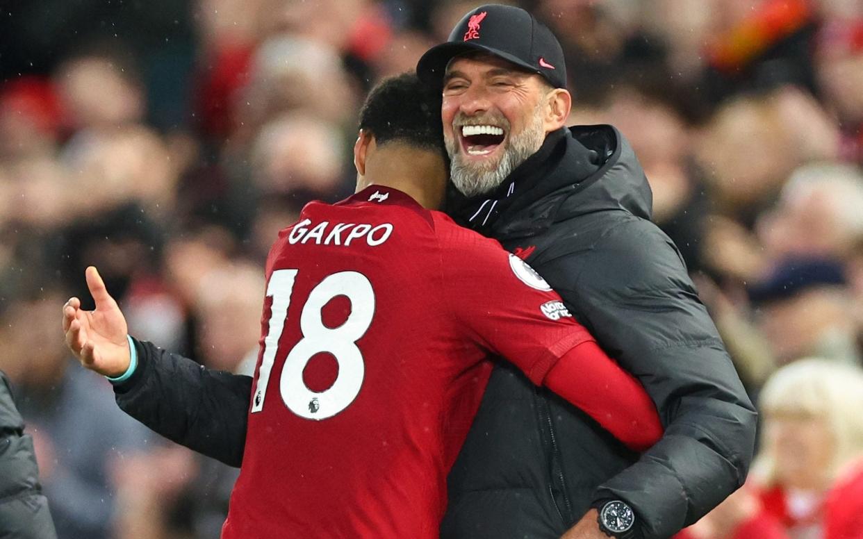 Cody Gakpo hugs Jurgen Klopp during Liverpool's 7-0 victory over Manchester United, March 5, 2023