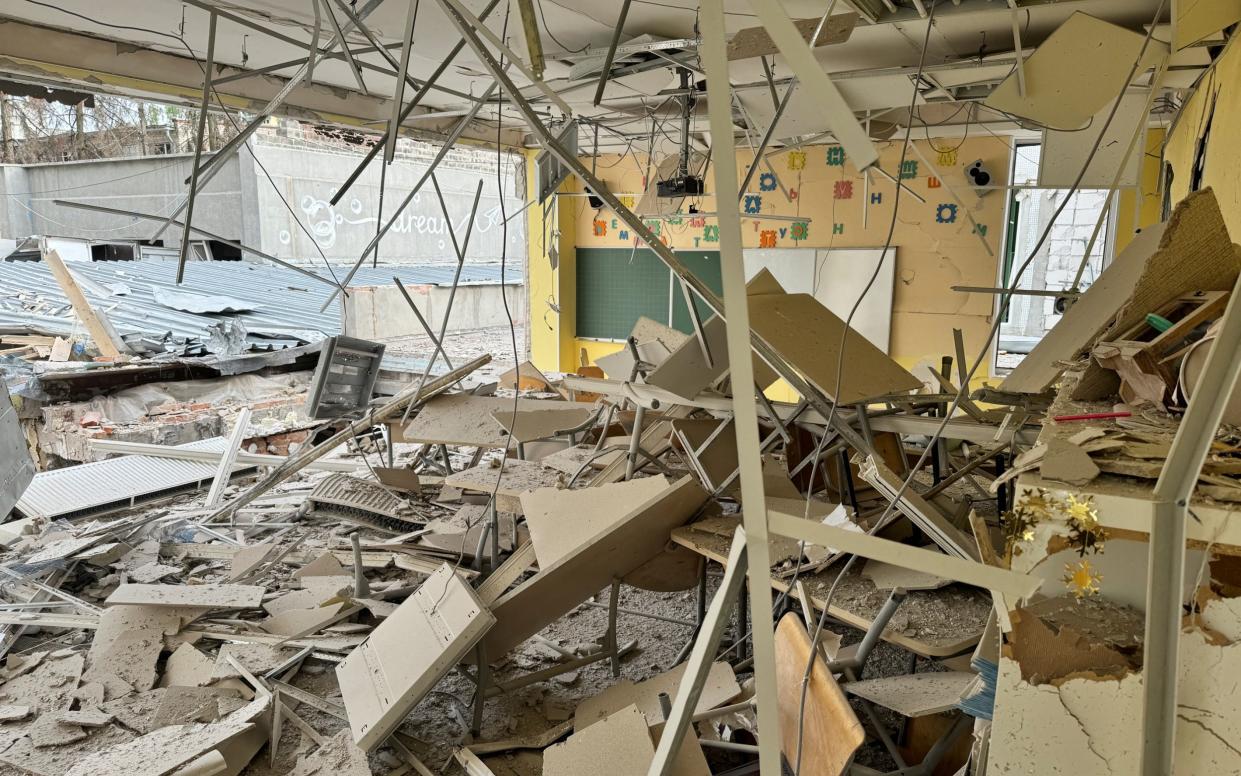 A school in Kharkiv lies in ruins on Sunday after a Russian attack