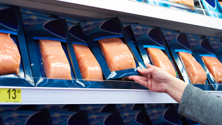 packs of salmon at grocery store