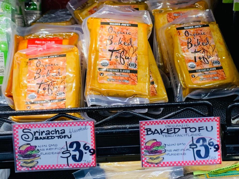 packs of trader joe's baked tofu on shelf in store