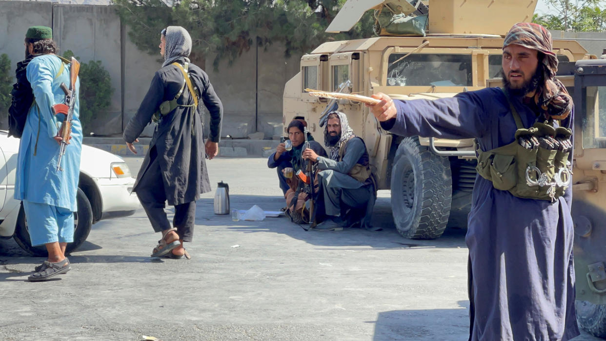 Taliban forces block the roads around the airport in Kabul on Aug. 27, 2021.